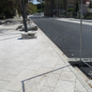 Fugáznak, aszfaltoznak, építik a színpadot a Fő téren